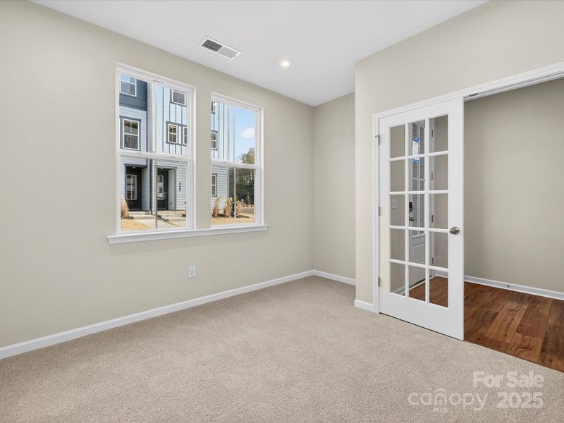 First Floor Flex Space Ideal for Home Office or Secondary Living.