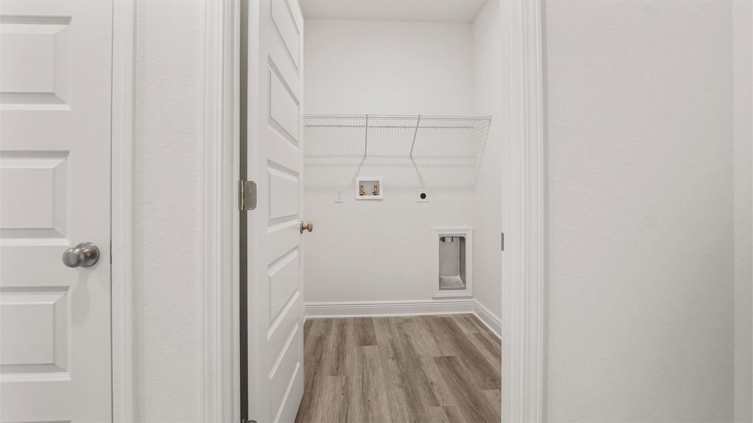 Representative furnished interior of a home built from the Madison by D.R. Horton in Owl's Head Farms, Freeport (Image 18).