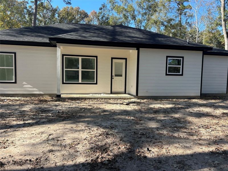 Exterior details and patio area of a home in , Woodbranch (Image 1). Exterior details and patio area of a home in , Woodbranch (Image 1).
