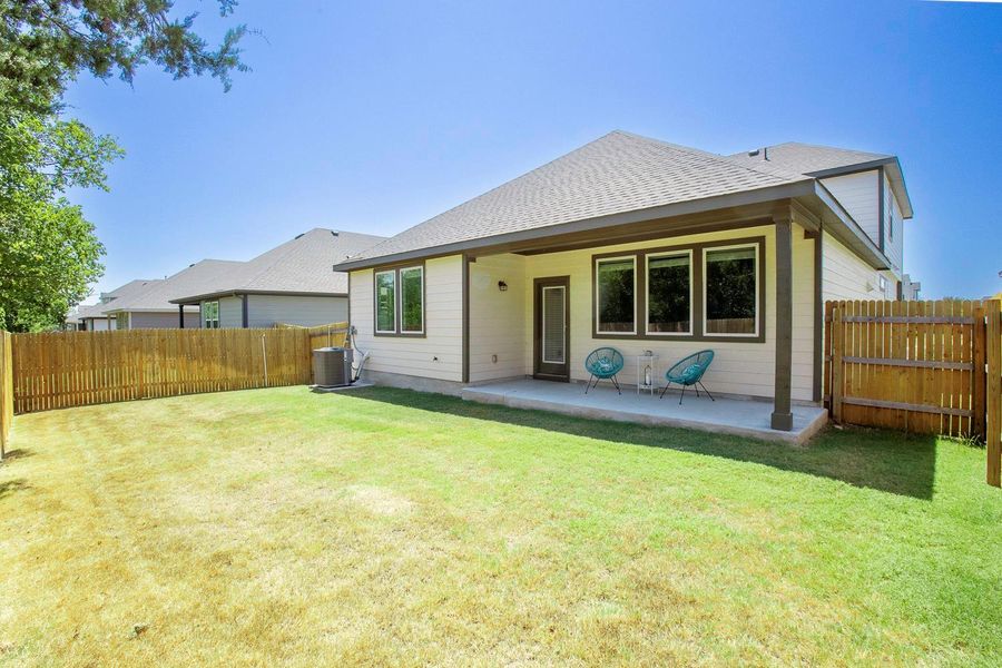 Front exterior of a new home in Brooks Ranch, Kyle, TX, highlighting curb appeal (Image 28).