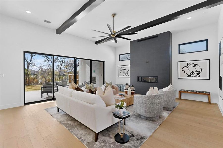 16' Anderson sliding doors allow for full view of greenspace beyond wrought iron fence.  Low maintenance with high impact.