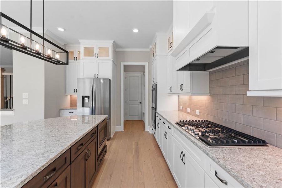 Furnished interior view inside a new home in Bellwyn, Johns Creek (Image 7).
