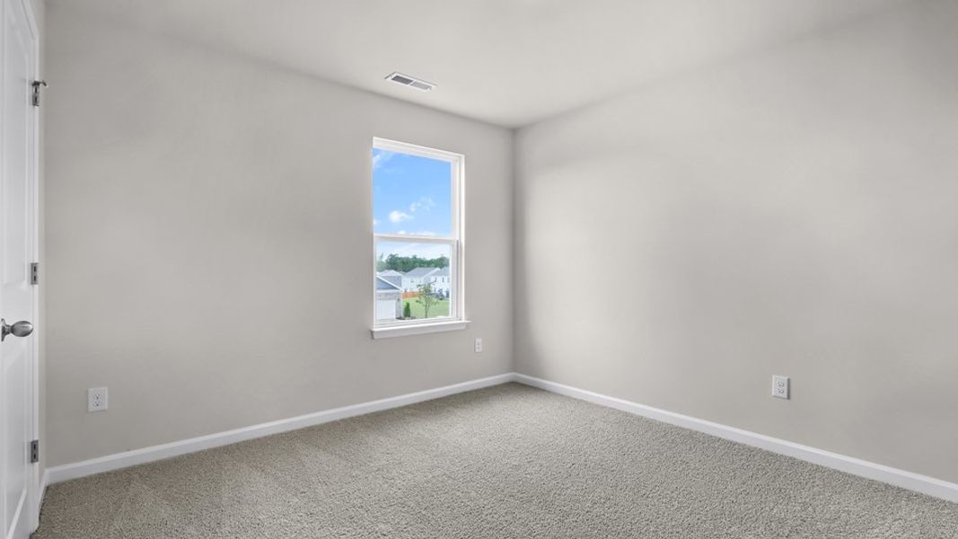 Spacious, unfurnished interior of a new home in The Reserve at Prestleigh, Wake Forest (Image 19).