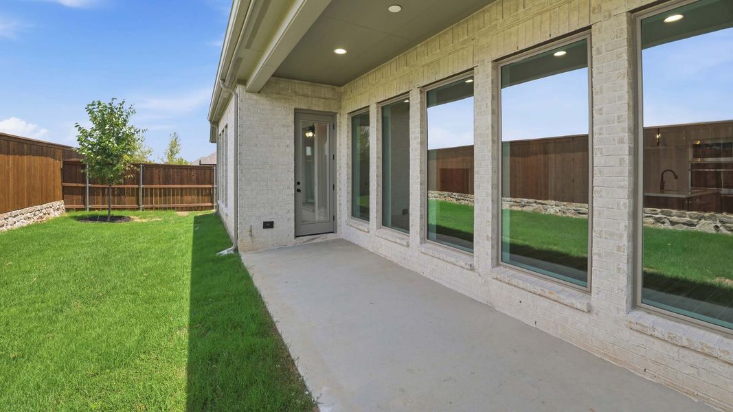Exterior details and patio area of a home in M3 Ranch, Mansfield (Image 3). Exterior details and patio area of a home in M3 Ranch, Mansfield (Image 3).