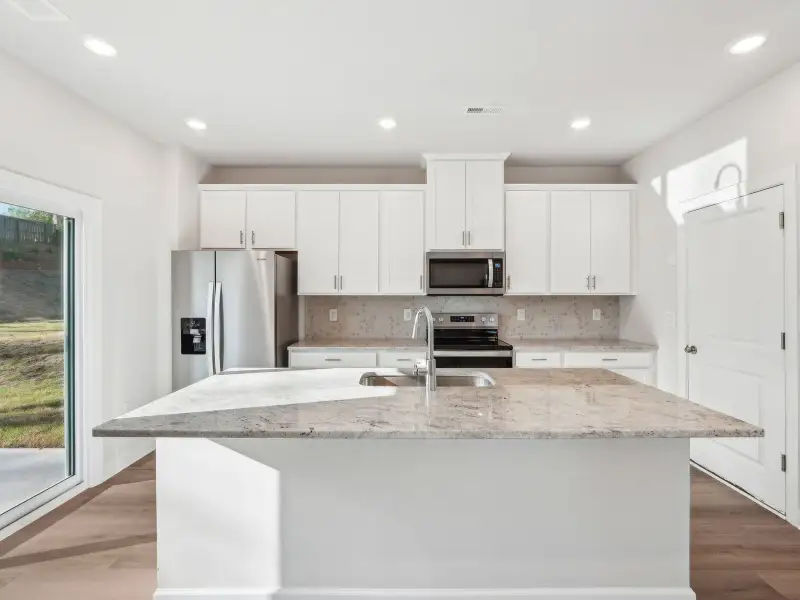 Furnished interior view inside a new home in Walnut Reserve, Conover (Image 4).