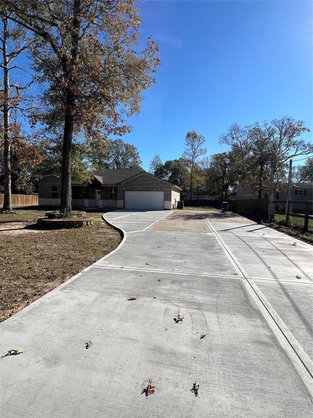 Front exterior of a new home in , Cleveland, TX, highlighting curb appeal (Image 28). Front exterior of a new home in , Cleveland, TX, highlighting curb appeal (Image 28).