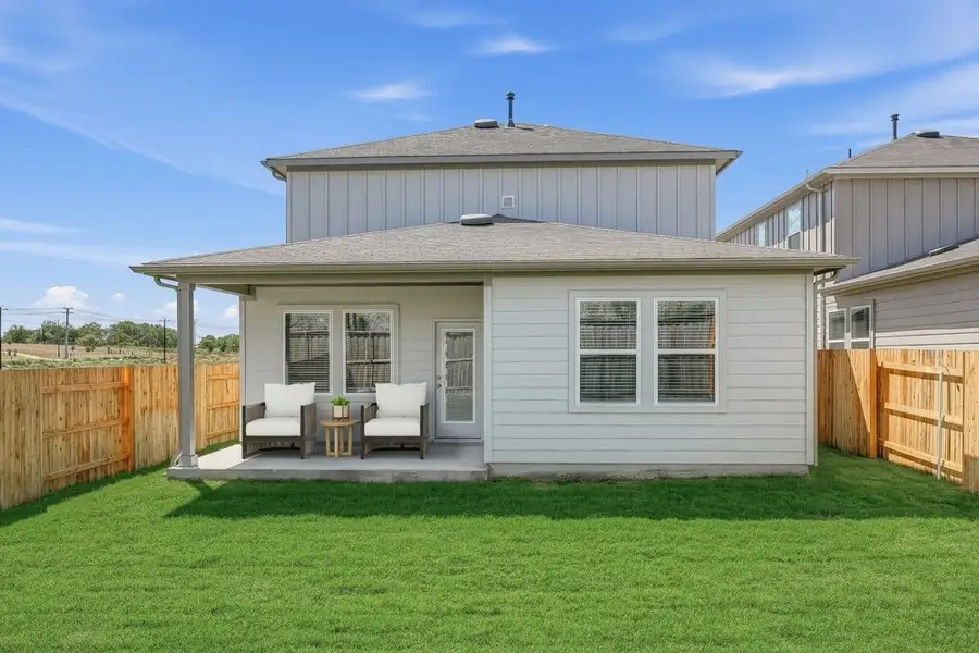 Exterior details and patio area of a home in Sunfield, Buda (Image 3).
