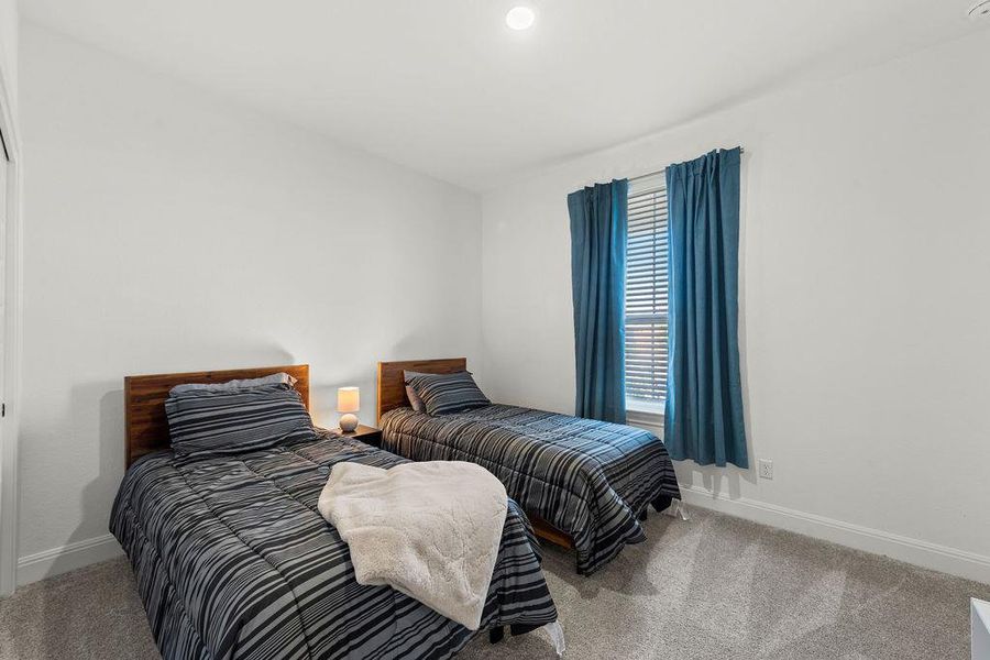 Secondary bedroom near the front of the house.