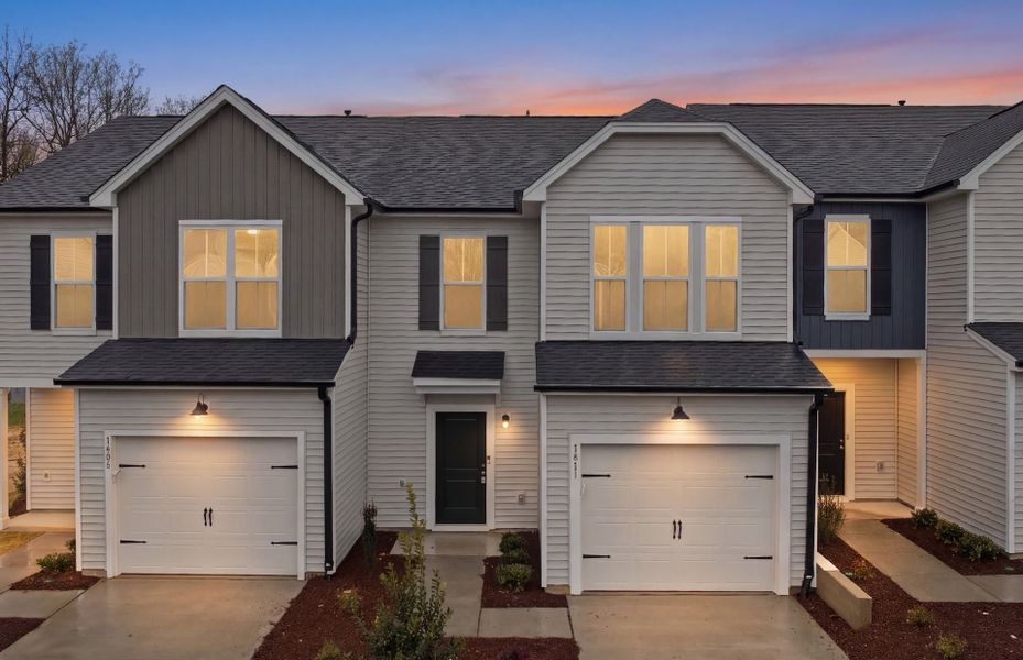 Front exterior of a new home in Flemingfield, Greensboro, NC, highlighting curb appeal (Image 25).