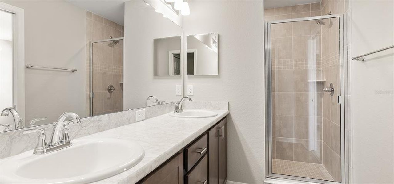 Furnished interior view inside a new home in Harbor at Lake Henry - Townhomes, Winter Haven (Image 9).