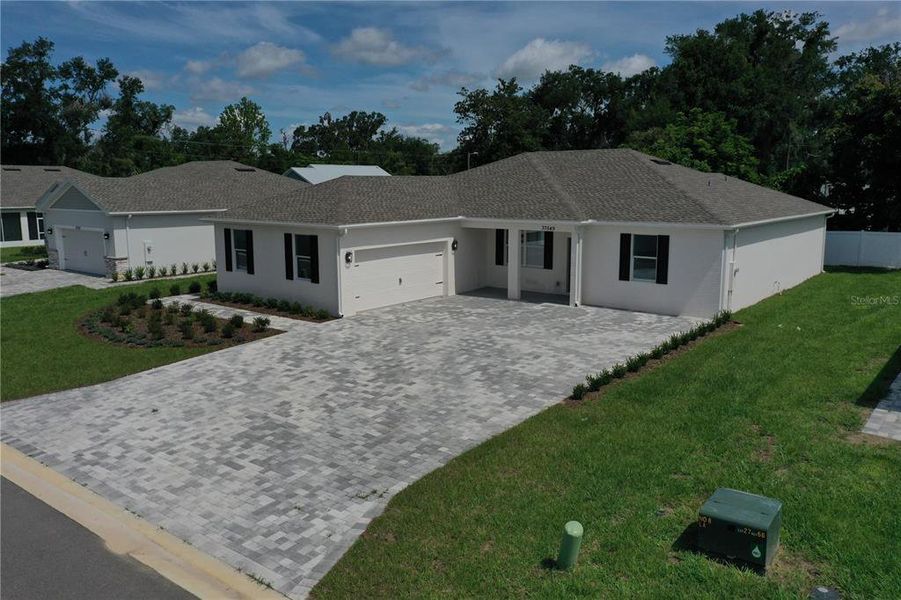 Front exterior of a new home in , Dade City, FL, highlighting curb appeal (Image 33).