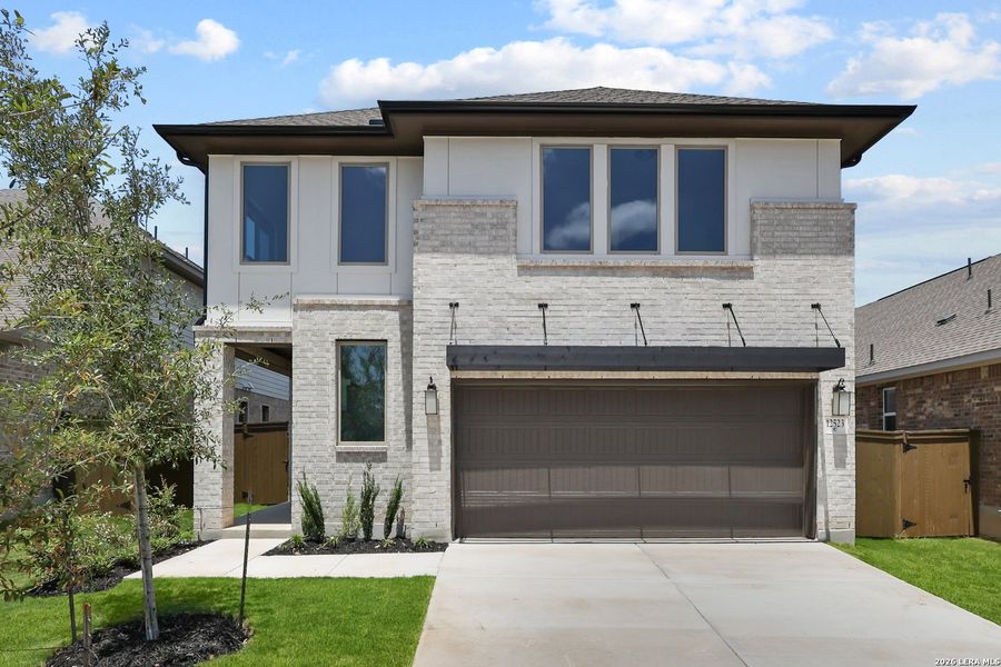 Front exterior of a new home in Stillwater Ranch, San Antonio, TX, highlighting curb appeal (Image 23).