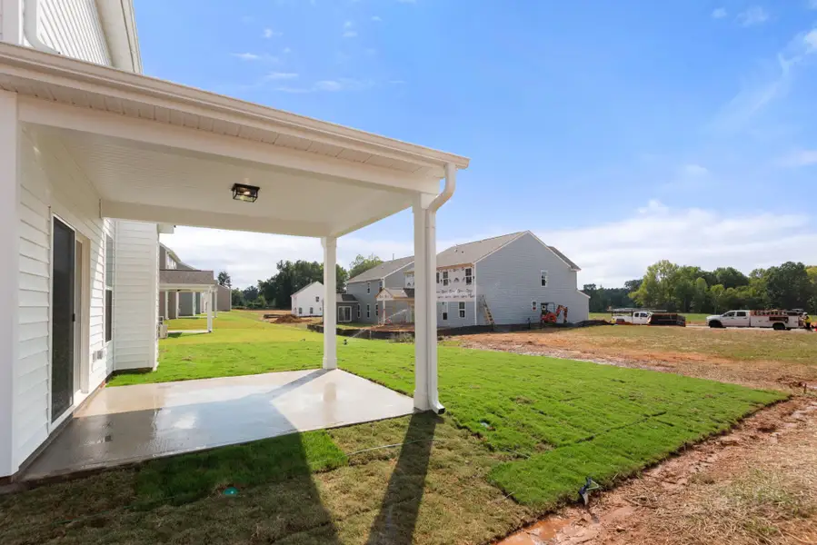 Exterior details and patio area of a home in Hayes Village, Greensboro (Image 2).