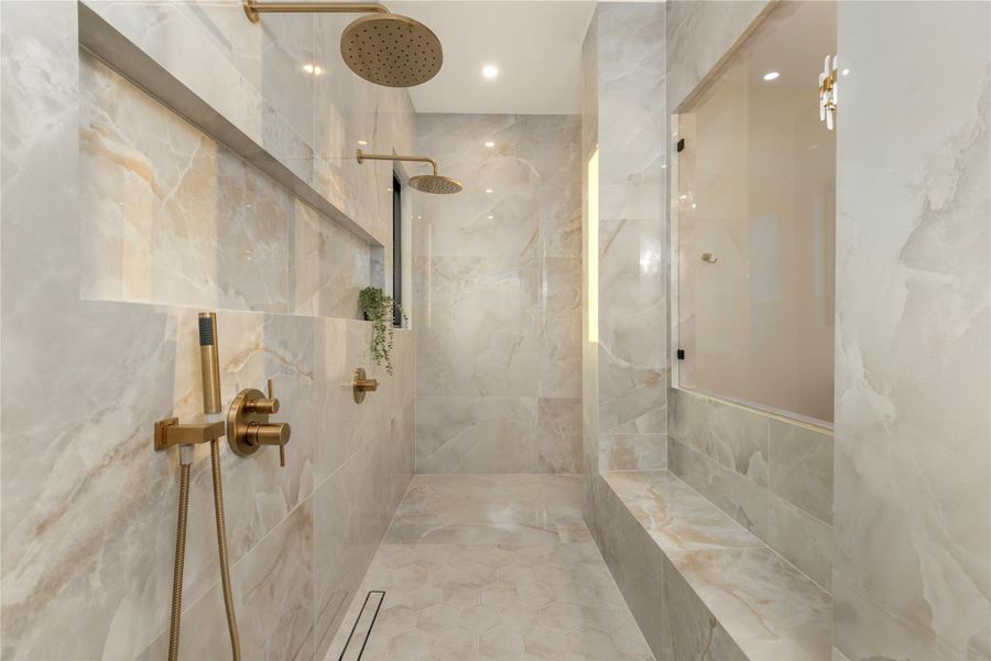 Full bath with tiled shower