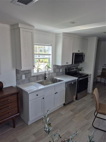 Furnished interior view inside a new home in , Lake Wales (Image 7).
