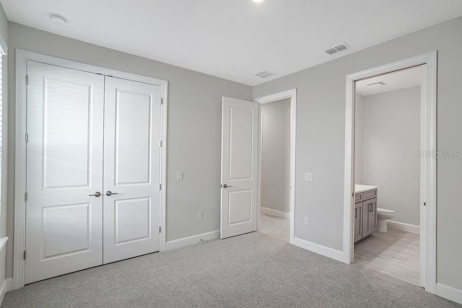Spacious, unfurnished interior of a new home in Esplanade at Center Lake Ranch, St. Cloud (Image 22).