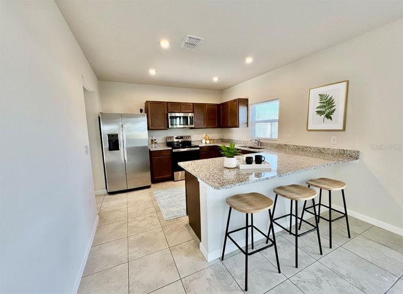 Furnished interior view inside a new home in , Haines City (Image 11).