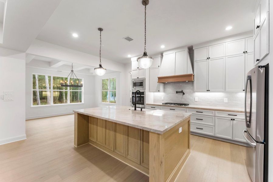 Yes, there is storage on both sides of the kitchen island.
