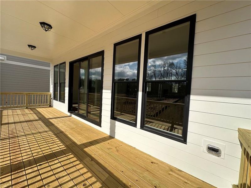 Exterior details and patio area of a home in Waterside Single Family, Peachtree Corners (Image 22).