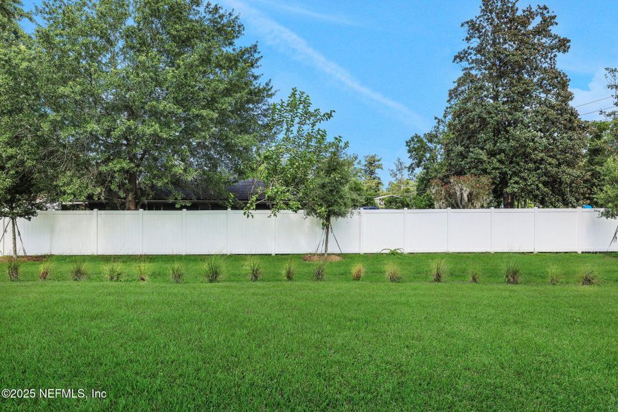 Front exterior of a new home in Kasen Oaks, Jacksonville, FL, highlighting curb appeal (Image 17).