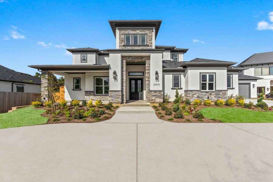 Front exterior of a new home in , Spring, TX, highlighting curb appeal (Image 23). Front exterior of a new home in , Spring, TX, highlighting curb appeal (Image 23).