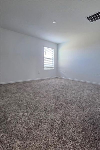 Spacious, unfurnished interior of a new home in Peace Creek Reserve, Winter Haven (Image 6).