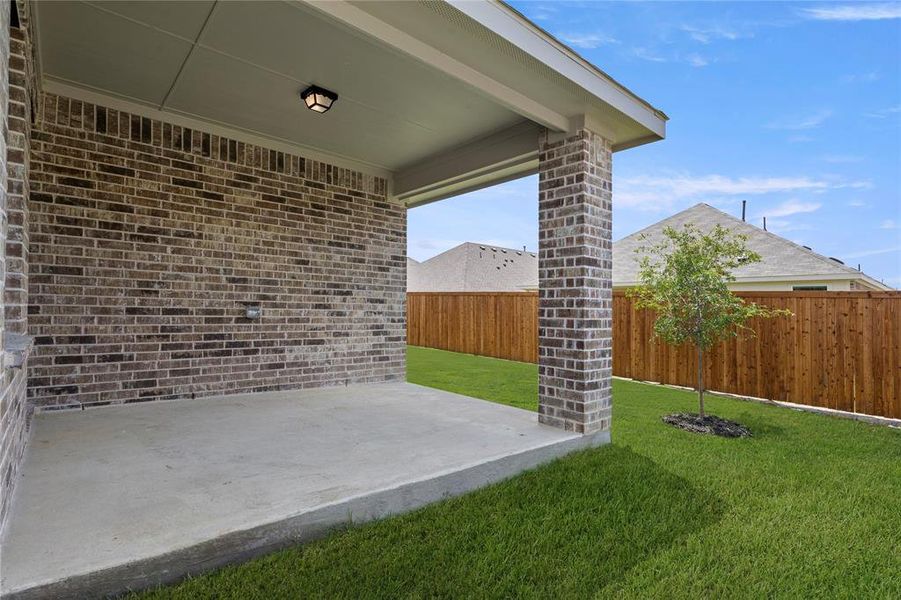 Exterior details and patio area of a home in Walden Pond, Forney (Image 3).