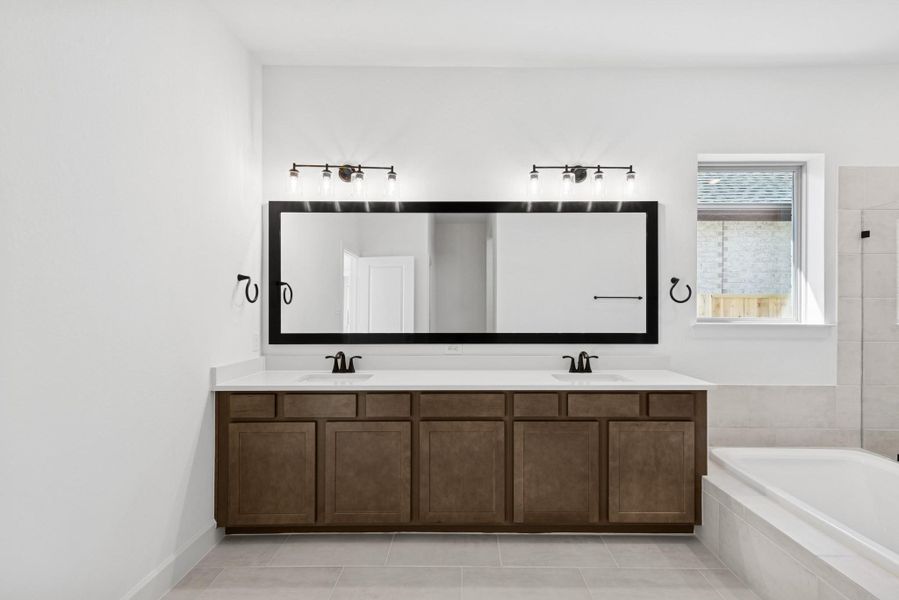 Furnished interior view inside a new home in Meridiana 55' Homesites, Manvel (Image 15).