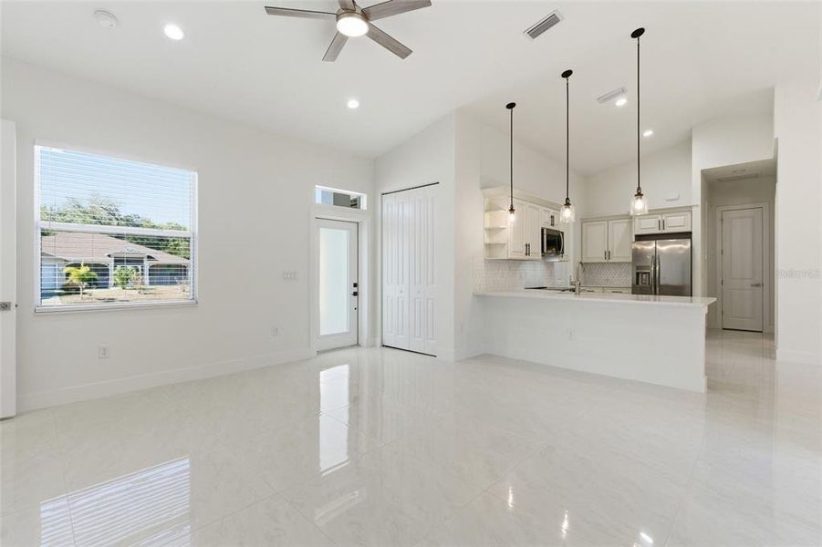 Spacious, unfurnished interior of a new home in , Port Charlotte (Image 27).