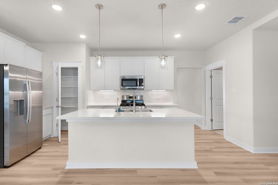 Furnished interior view inside a new home in Prairie Green, Converse (Image 6).