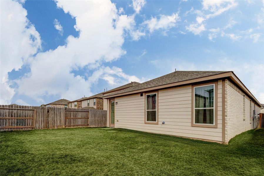 Exterior details and patio area of a home in , Katy (Image 25).