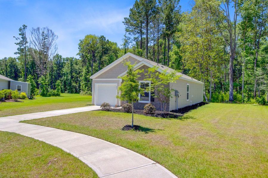 Front exterior of a new home in Stone Ridge, Moncks Corner, SC, highlighting curb appeal (Image 24).