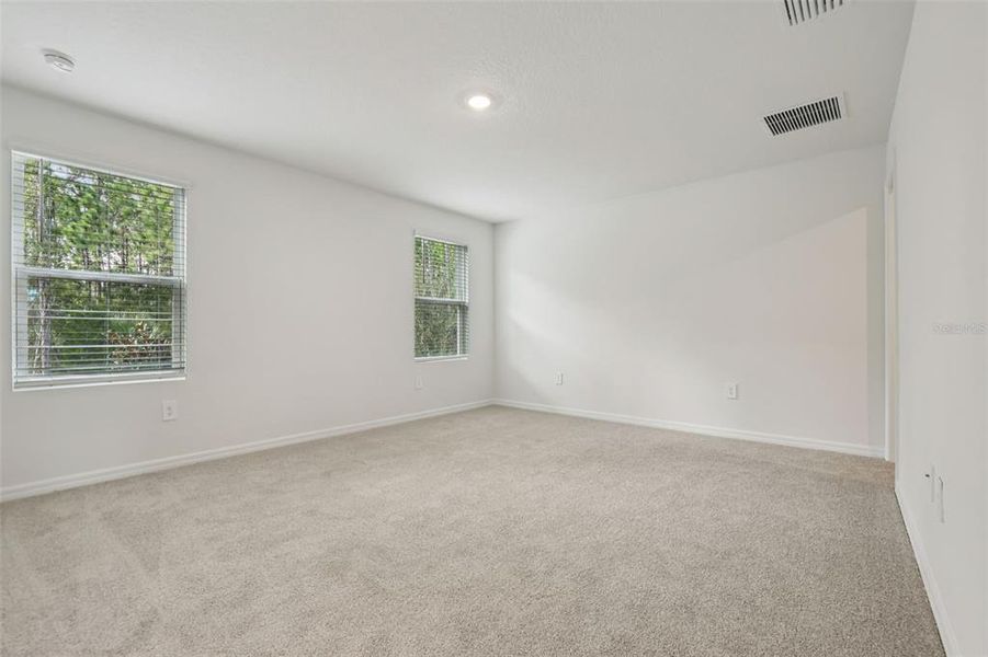 Spacious, unfurnished interior of a new home in Bradford Park, Ormond Beach (Image 26).