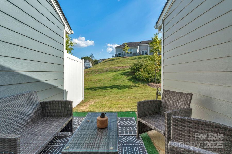 Front exterior of a new home in , Troutman, NC, highlighting curb appeal (Image 27).