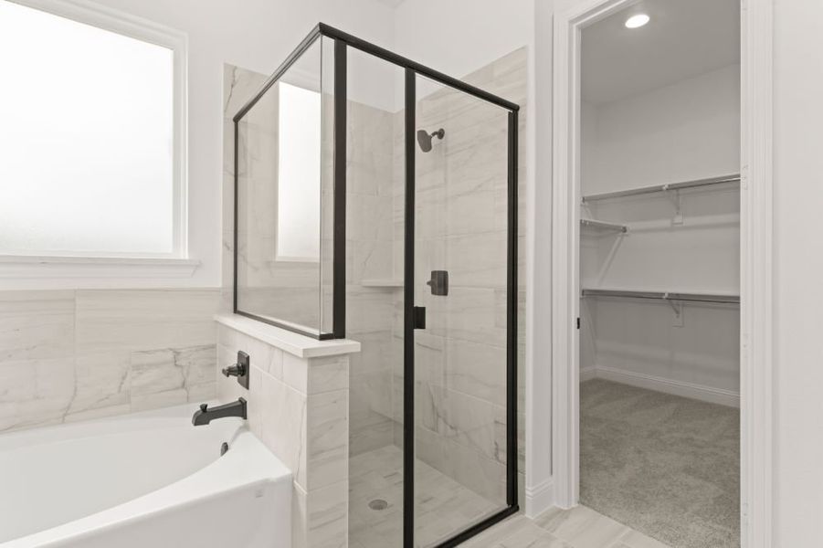Representative furnished interior of a home built from the The Whitney by UnionMain Homes in Cambridge Crossing, Celina (Image 13).
