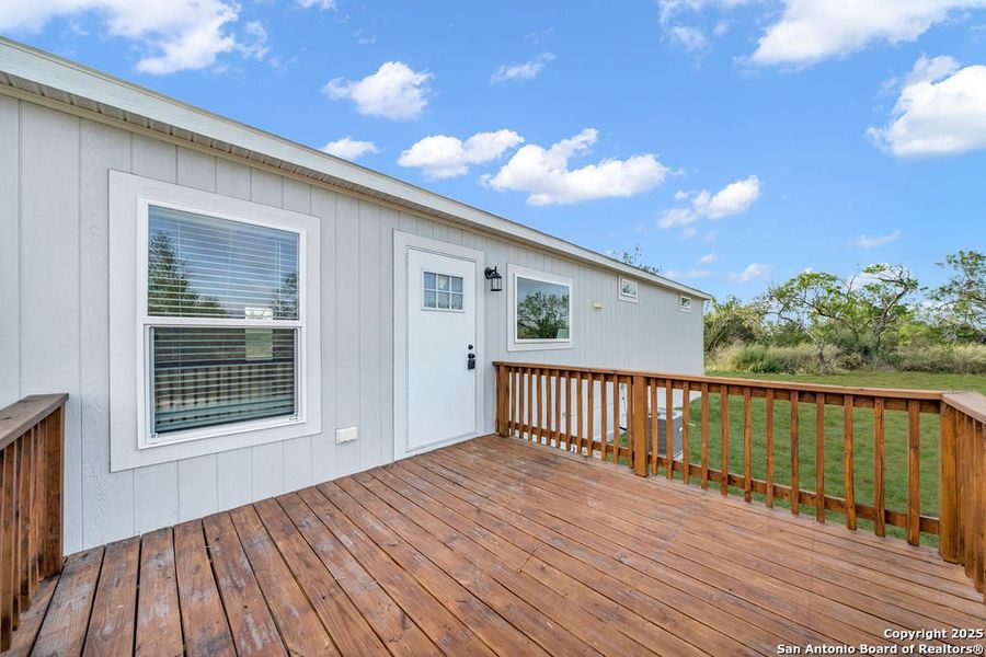Front exterior of a new home in , Moore, TX, highlighting curb appeal (Image 17).