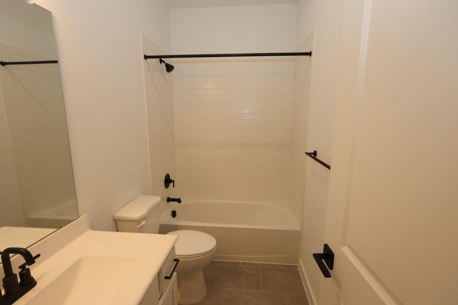 Furnished interior view inside a new home in Tarkington Timbers, Cleveland (Image 14).