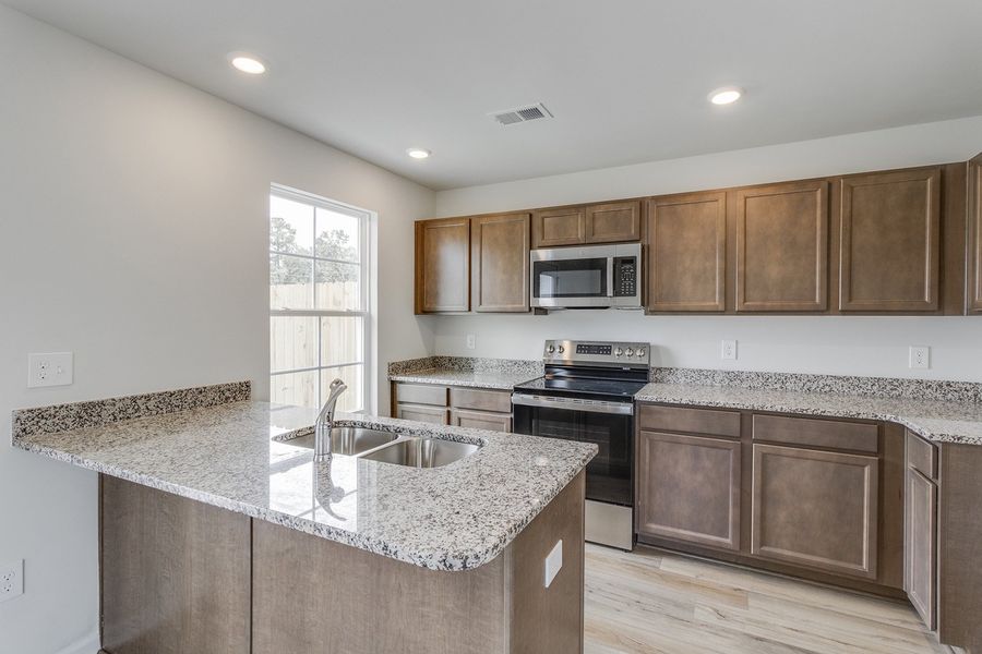 Furnished interior view inside a new home in Padgett Commons, Hopkins (Image 7).