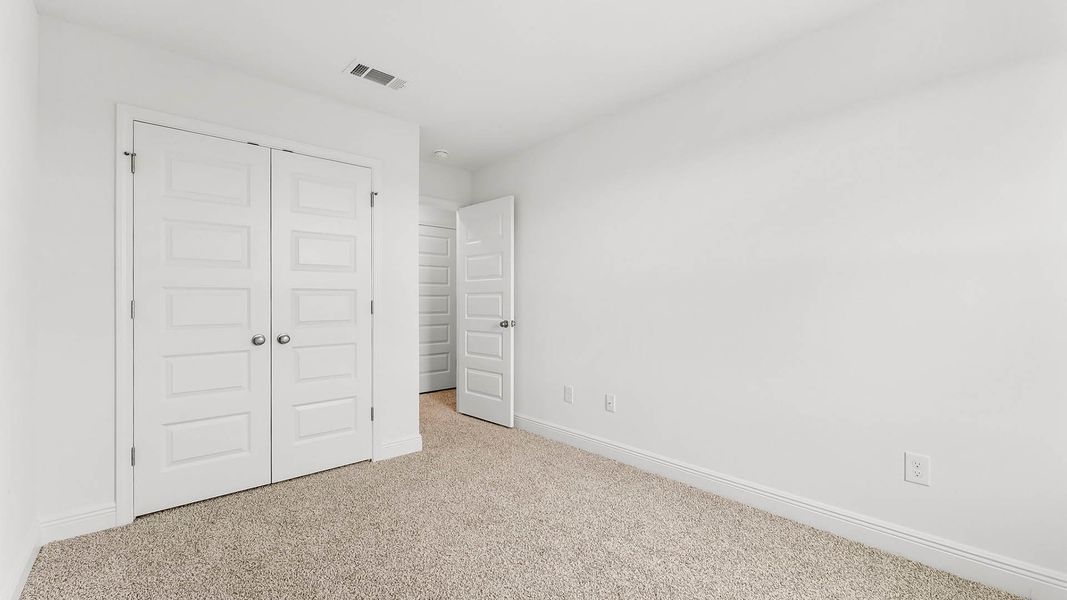 Spacious, unfurnished interior of a new home in Chateau Nemours, Port Saint Joe (Image 23).