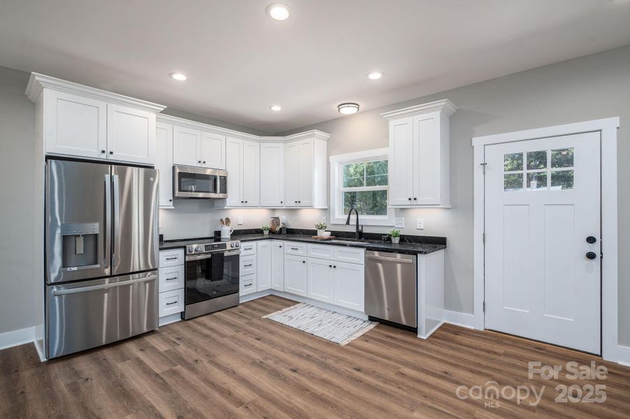 Furnished interior view inside a new home in , Lowell (Image 3).