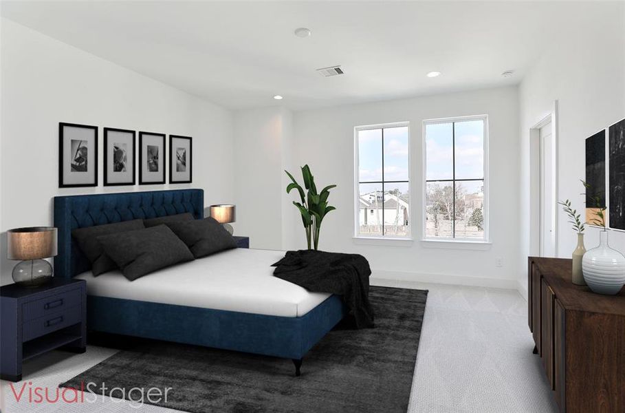 Relax in the cozy comfort of carpeted floors in this secondary bedroom.