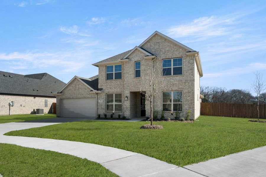 Front exterior of a new home in Kentsdale Farms, DeSoto, TX, highlighting curb appeal (Image 2). Front exterior of a new home in Kentsdale Farms, DeSoto, TX, highlighting curb appeal (Image 2).