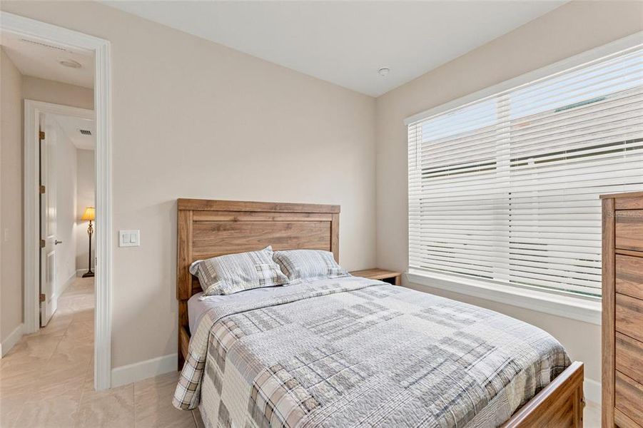Furnished interior view inside a new home in , Poinciana (Image 19).