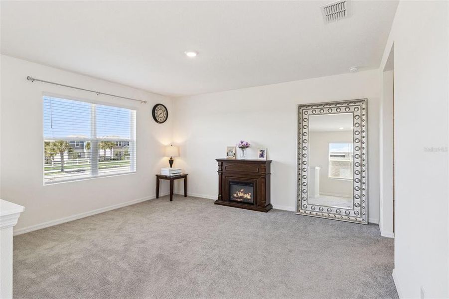 Furnished interior view inside a new home in Harmony at Lake Eloise, Winter Haven (Image 32).