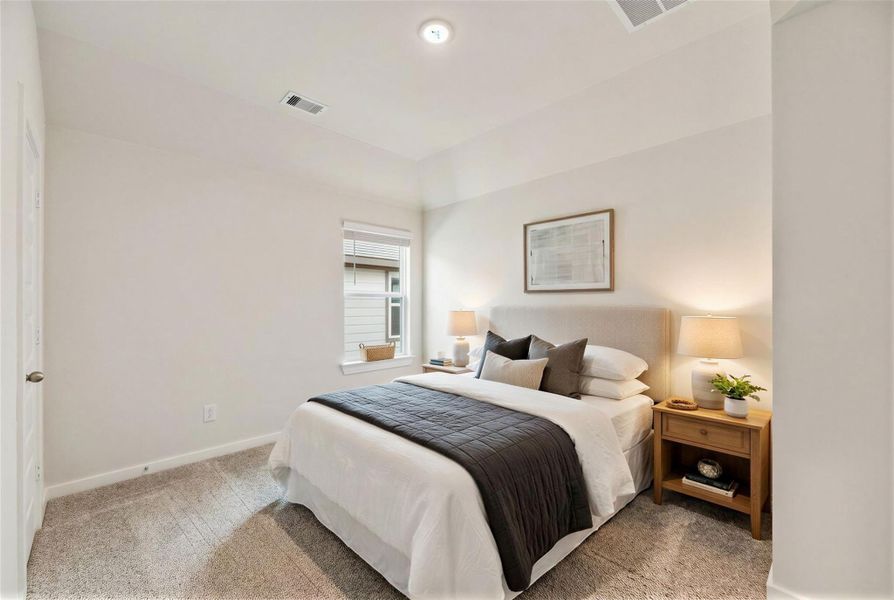 Virtually staged representation of the secondary bedroom.