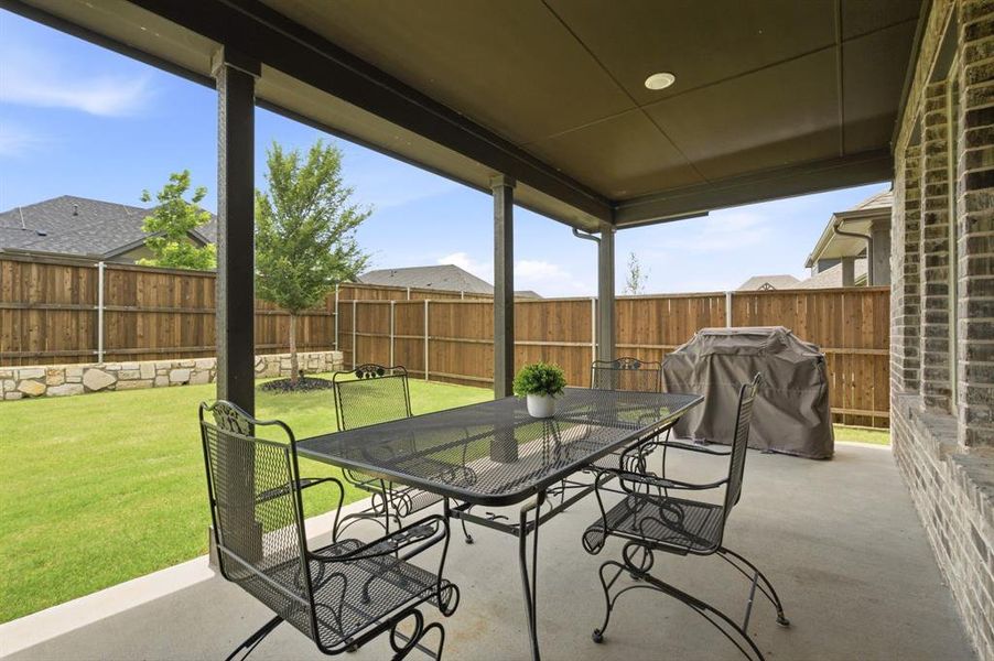 Large fenced backyard with covered patio and plenty of room to play, garden, entertain, or add future outdoor living. A rare yard size buyers will notice.