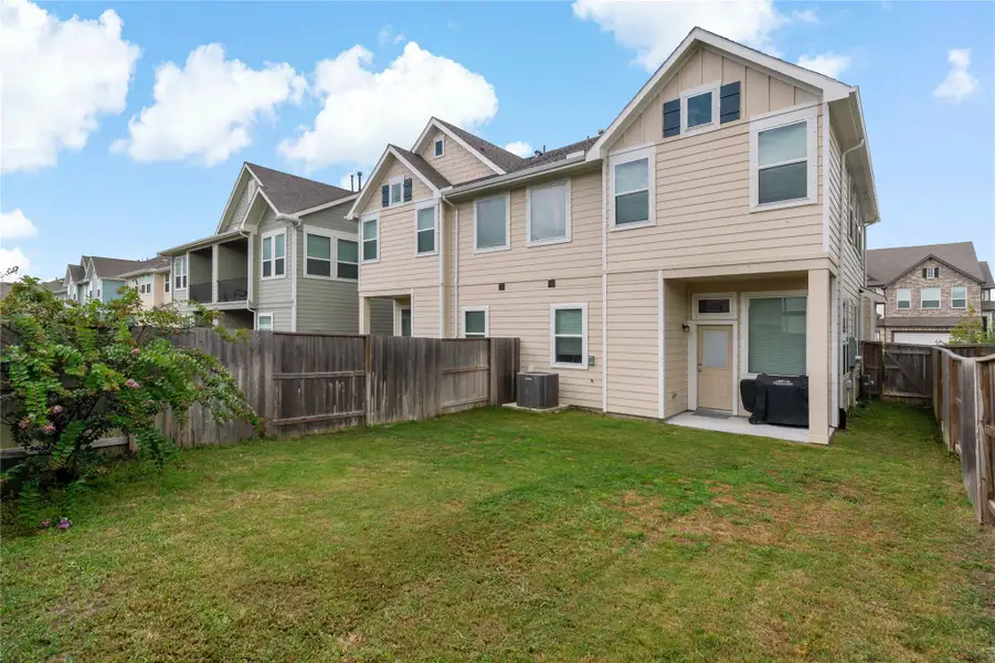 Charming two-story home with a spacious fenced backyard, perfect for outdoor gatherings and relaxation. Charming two-story home with a spacious fenced backyard, perfect for outdoor gatherings and relaxation.
