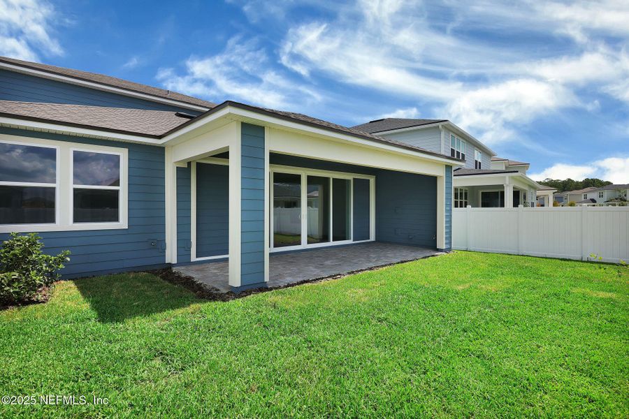 Front exterior of a new home in The Preserve at Bannon Lakes, St. Augustine, FL, highlighting curb appeal (Image 18). Front exterior of a new home in The Preserve at Bannon Lakes, St. Augustine, FL, highlighting curb appeal (Image 18).
