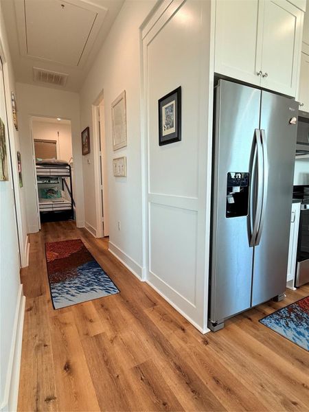 Hallway to utility and bedrooms.