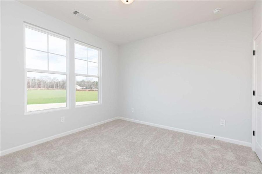 Spacious, unfurnished interior of a new home in River Oaks, Locust Grove (Image 17).